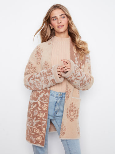 This stylish cardigan features wide sleeves, adding a touch of elegance to any outfit. Perfect for layering in cooler weather by Charlie B.