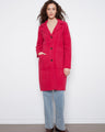Elegant coat featuring a button closure and tailored neckline, perfect for a chic look. Crafted with care by Charlie B.