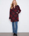 Elegant coat featuring a tailored collar, perfect for a sophisticated look. Designed for comfort and style by Charlie B.