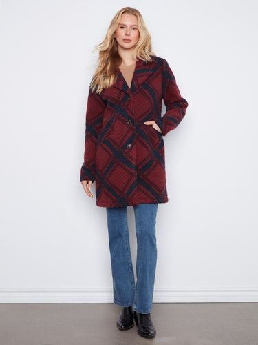 Elegant coat featuring a tailored collar, perfect for a sophisticated look. Designed for comfort and style by Charlie B.