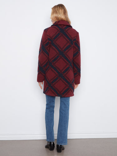 Stylish welt pockets enhance the functionality and design of this beautiful coat, crafted with attention to detail by Charlie B.