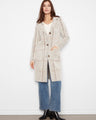 Plaid knit coatigan with a notched collar and button closure, offering a relaxed fit by Charlie B.