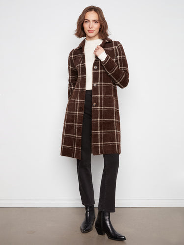 Brown plaid coat with a notched collar and front button closure, offering a stylish touch to any outfit by Charlie B.