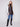 Mocha-colored quilted faux leather vest featuring a rib knit neck and snap button front closure by Charlie B.
