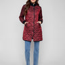 Cabernet quilted puffer jacket featuring zipper front with snap buttons, perfect for chilly days by Charlie B.
