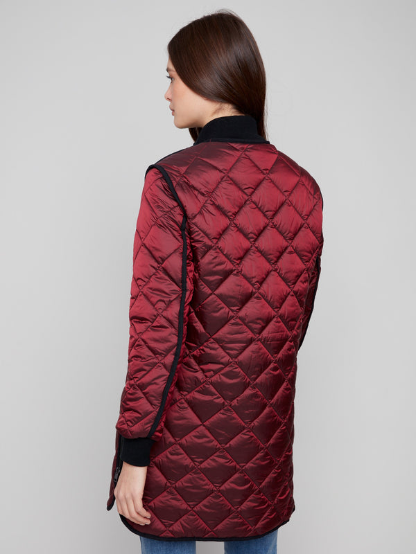 Elegant cabernet quilted design with two front welt pockets for convenience and style by Charlie B.