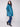 Elegant evergreen puffer jacket showcasing a classic quilted design by Charlie B.