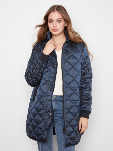 Front zip closure combined with snap buttons ensures comfort and style in this coat by Charlie B.
