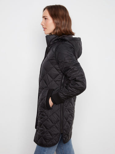 Stylish black coat with side zippers for adjustable fit and enhanced mobility. By Charlie B.