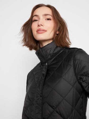 Classic black coat featuring durable materials ideal for everyday wear in cooler weather. By Charlie B.