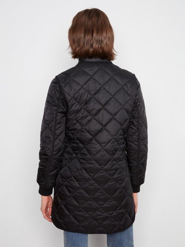Trendy quilted design in a versatile black shade, adding elegance to any wardrobe. By Charlie B.