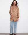 Truffle-colored puffer jacket with quilted pattern and removable hood, featuring ribbed cuffs for added comfort by Charlie B.