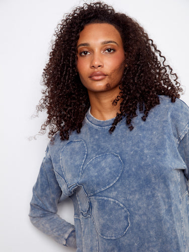 The drop shoulders on this stylish top provide a relaxed fit, perfect for everyday wear by Charlie B.