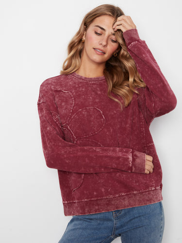This stylish piece combines trendy design elements like drop shoulders with practical details like ribbed hems for versatility by Charlie B.