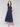 Navy blue V-neck eyelet dress featuring sleeveless design by Charlie B.