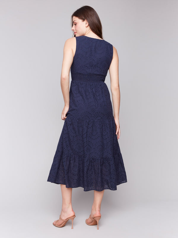 Navy blue dress with elastic waistband and sleeveless style by Charlie B.