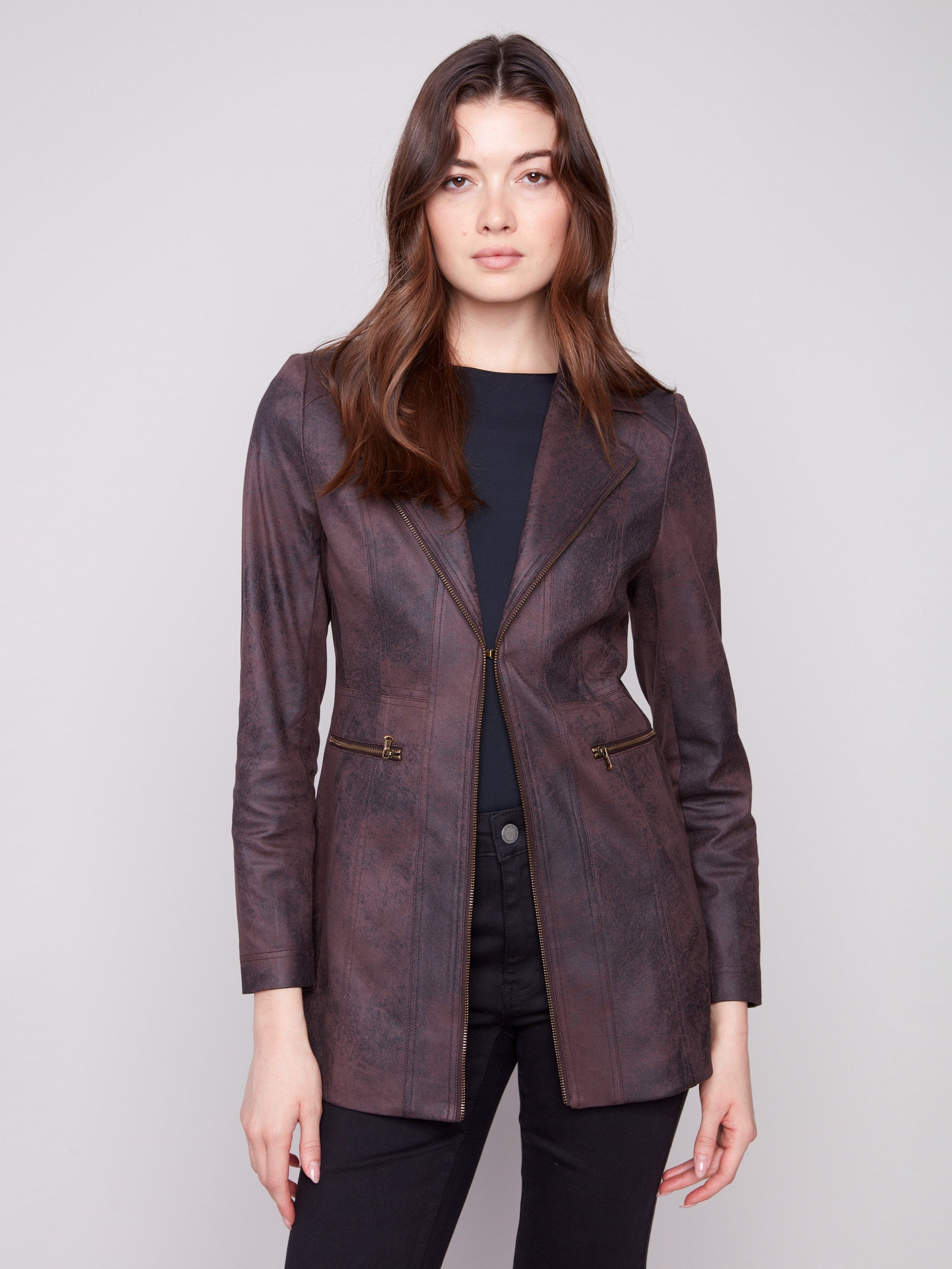 Embrace the vintage charm with this mocha jacket featuring two front zipper pockets for added style by Charlie B.