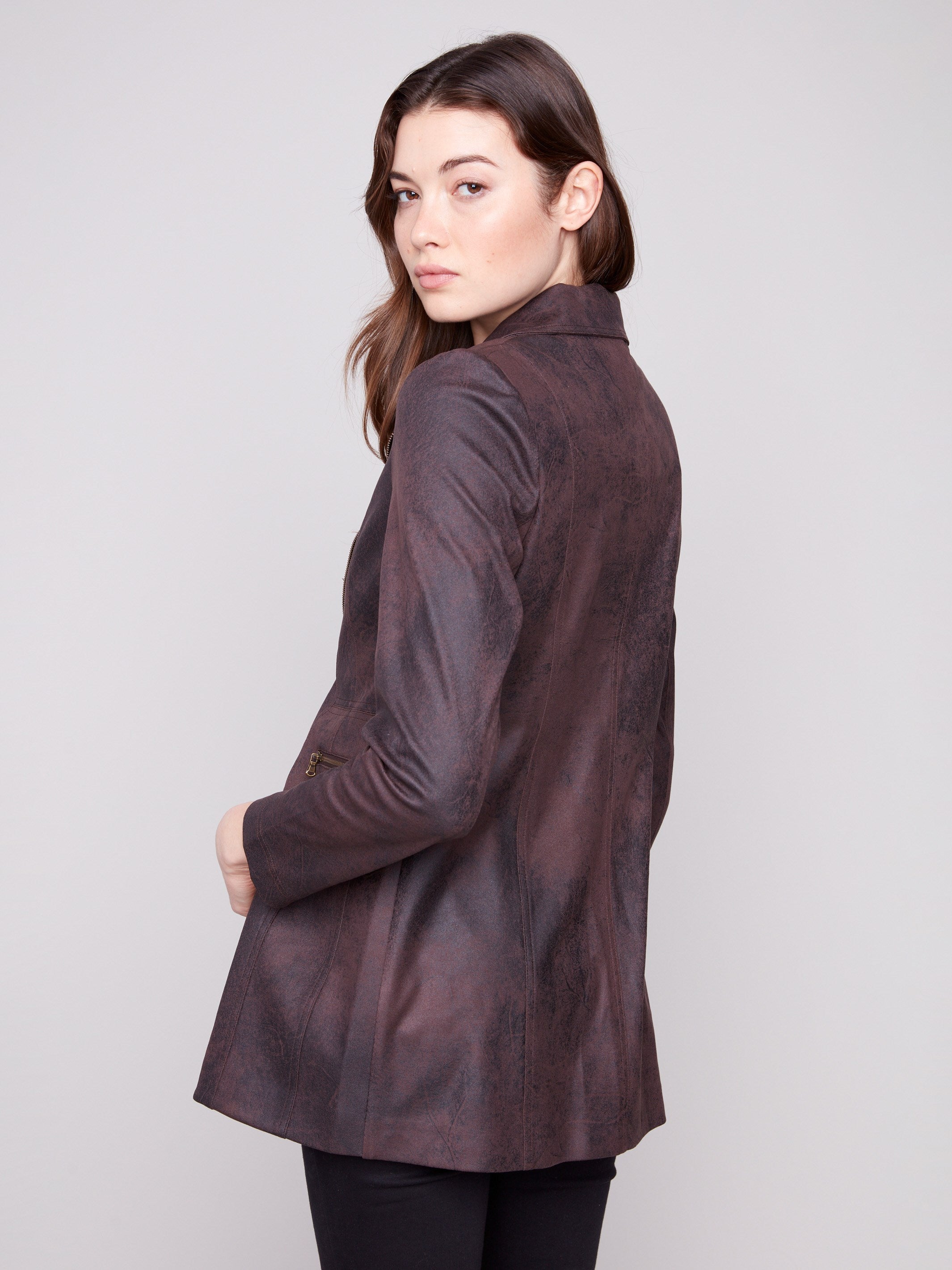 Faux suede texture in a rich mocha hue, complete with elegant zipper details for a modern edge by Charlie B.