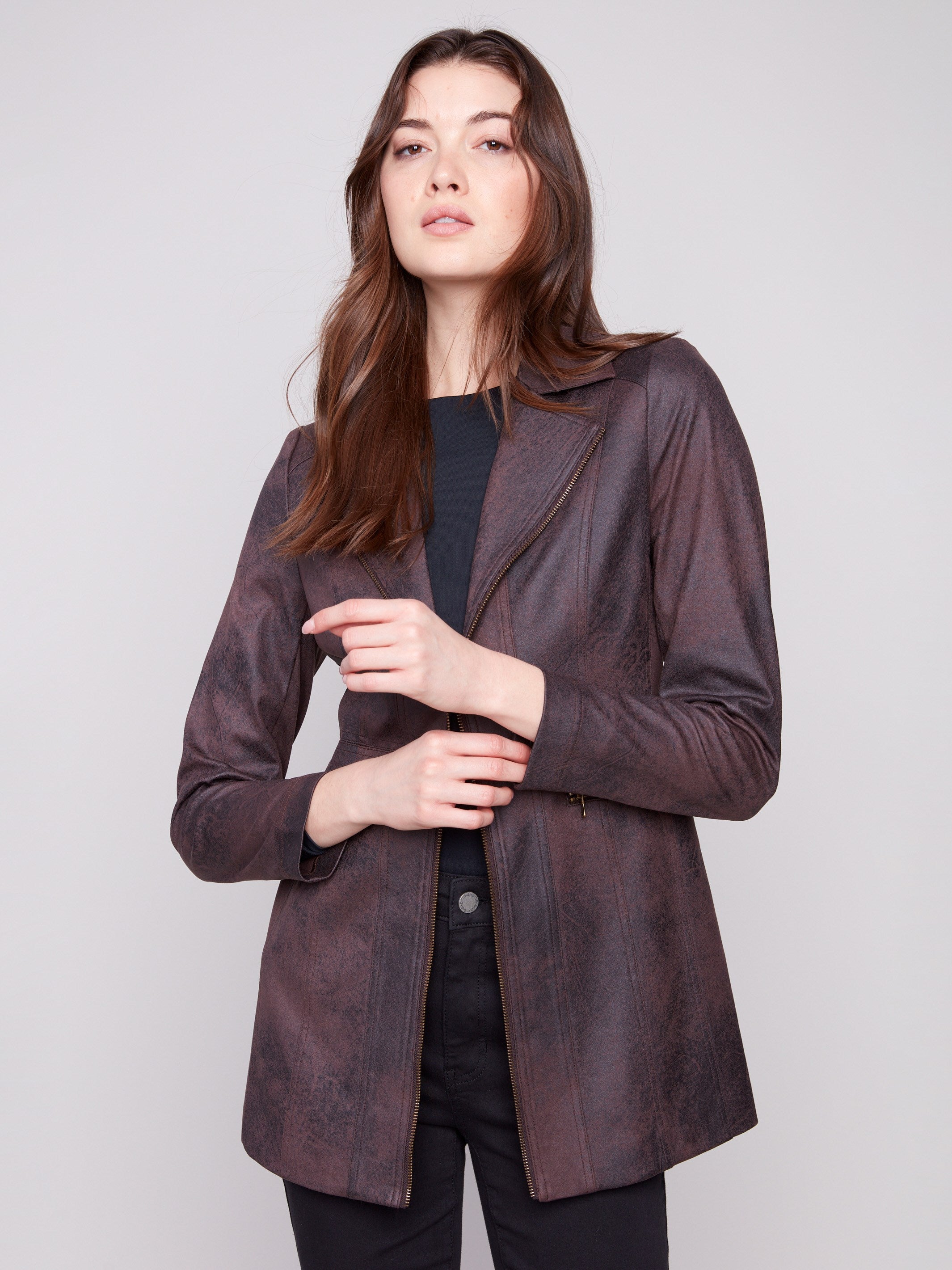 Lapel notch collar on this mocha faux suede jacket offers timeless sophistication and chic appeal by Charlie B.