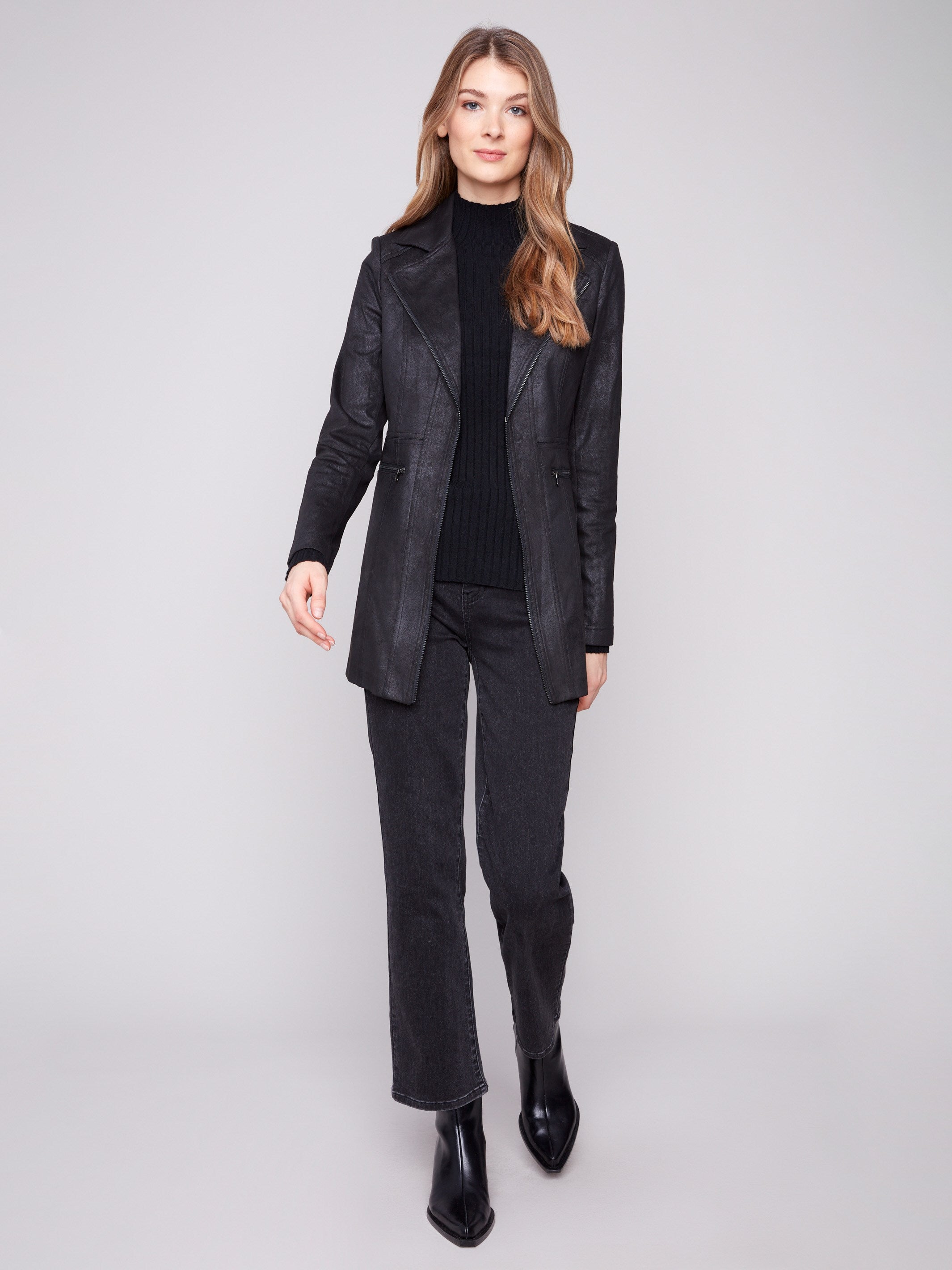 Timeless faux suede jacket in black showcasing its unique vintage texture for added flair by Charlie B.