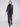 Timeless faux suede jacket in black showcasing its unique vintage texture for added flair by Charlie B.