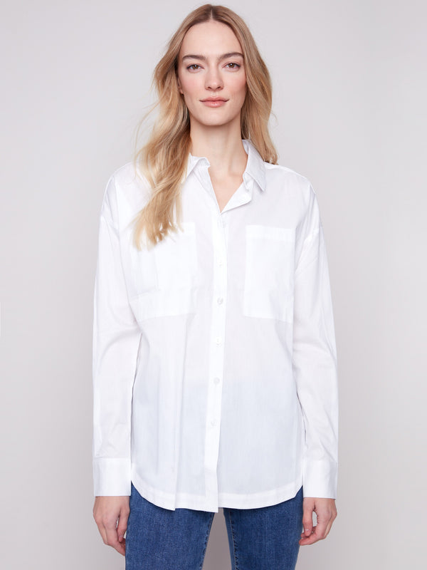 Versatile white poplin shirt designed with a comfortable loose fit for everyday wear by Charlie B.