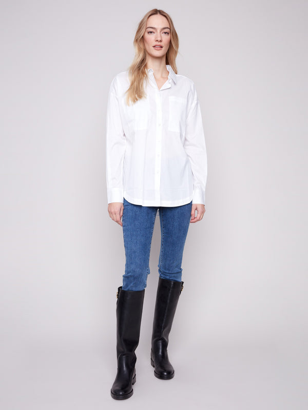 White long-sleeve poplin shirt with chest pockets and button-up front by Charlie B.