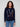 Navy sweater featuring colorful 'LOVE' embroidery in a playful design, paired with ribbed cuffs for added style by Charlie B.
