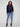 Stylish navy sweater with drop shoulder design and vibrant 'LOVE' letters. Perfect blend of comfort and chic by Charlie B.