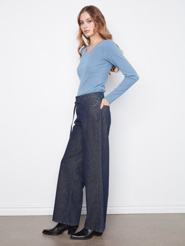 The belted design of these jeans adds a chic touch to any outfit. Experience the comfort of stretch denim by Charlie B.