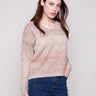 Latte-colored sweater featuring a stylish V-neck design and drop shoulders, perfect for a relaxed look by Charlie B.