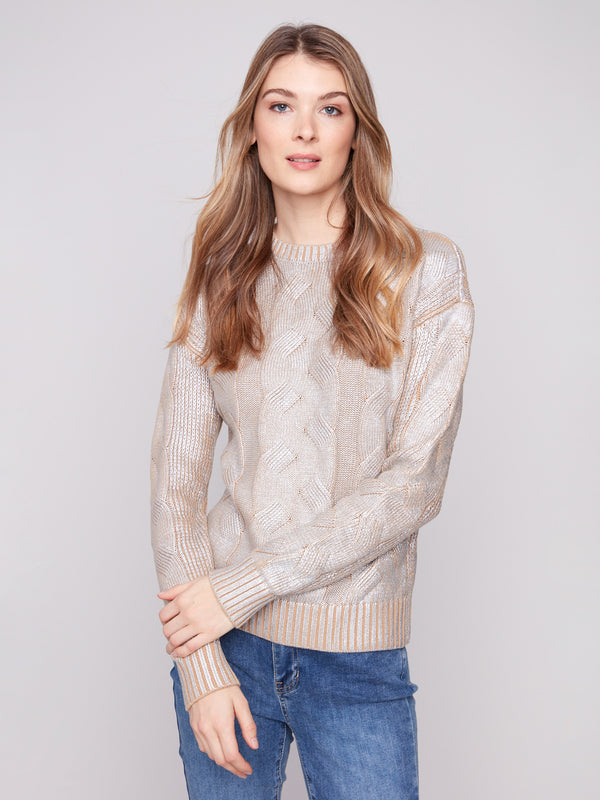 Shimmering cable knit sweater with a crew neck, crafted from metallic foiled fabric by Charlie B.