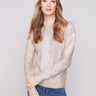 Shimmering cable knit sweater with a crew neck, crafted from metallic foiled fabric by Charlie B.