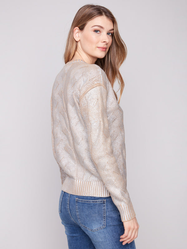 Chic silver cable knit sweater showcasing an exquisite crew neckline design by Charlie B.