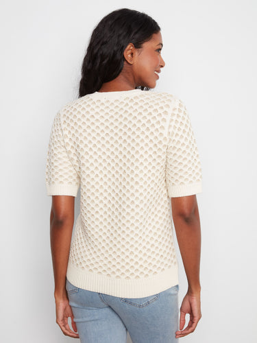 Crafted with attention to detail, the top's ribbed edges complement the overall design beautifully by Charlie B.