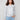 Silver knit hoodie with a metallic sheen, perfect for adding sparkle to casual outfits by Charlie B.