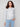 Silver knit hoodie with a metallic sheen, perfect for adding sparkle to casual outfits by Charlie B.