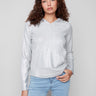 Silver knit hoodie with a metallic sheen, perfect for adding sparkle to casual outfits by Charlie B.