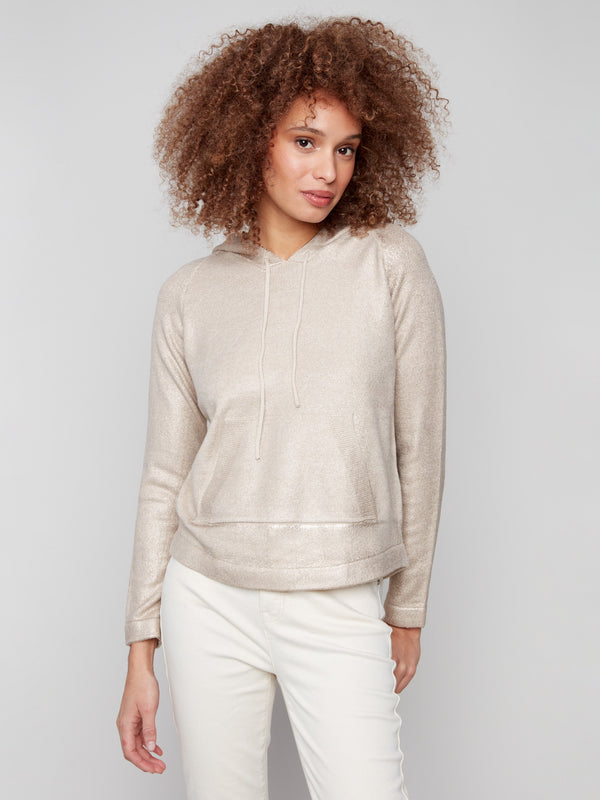 Keep essentials handy with the front pocket on this chic champagne metallic knit hoodie sweater by Charlie B.