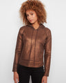 Copper metallic knit hoodie sweater with a stylish hooded design, featuring long raglan sleeves and a cozy feel by Charlie B.