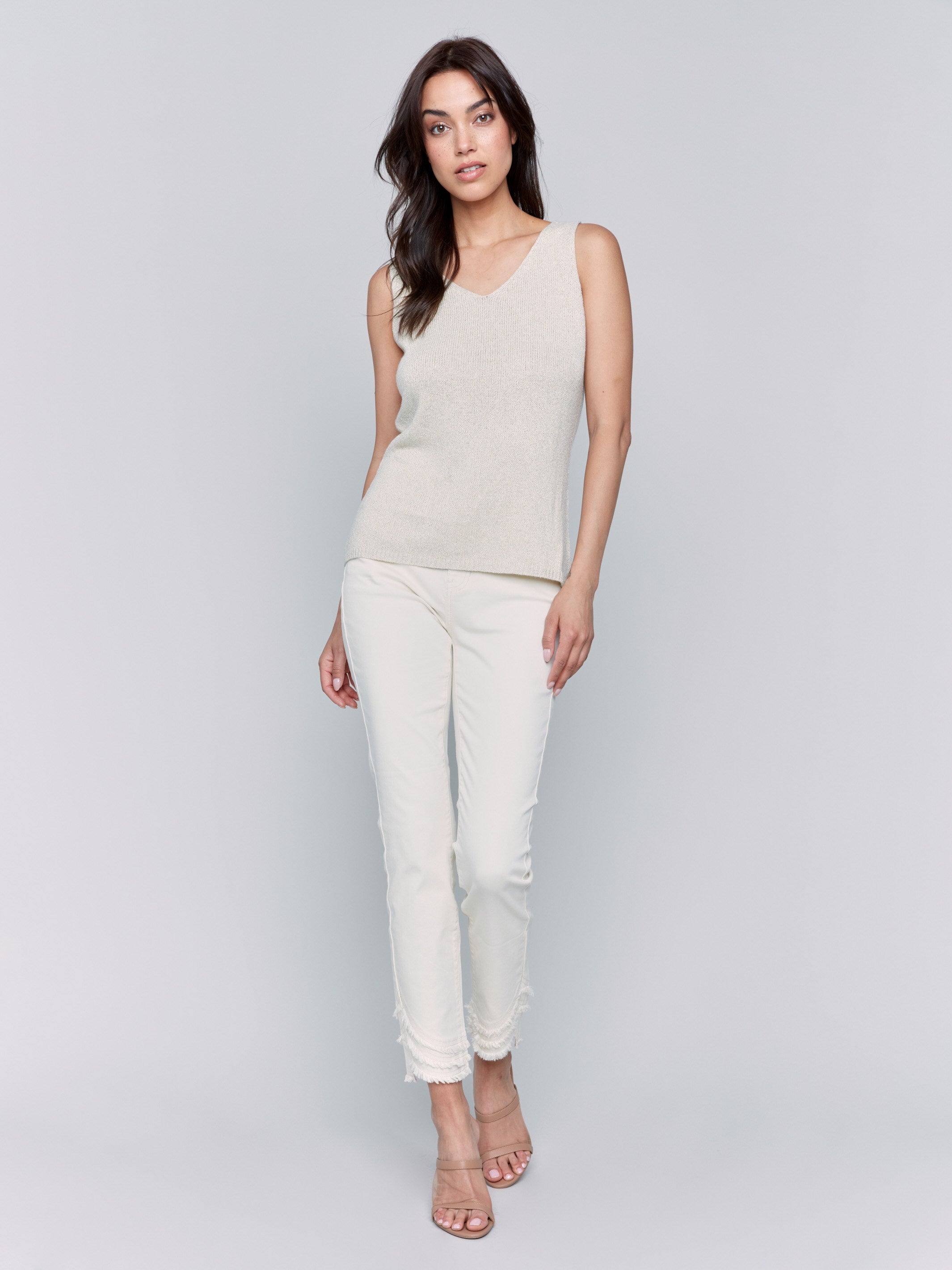 Metallic knit fabric top featuring a V-neck design by Charlie B.