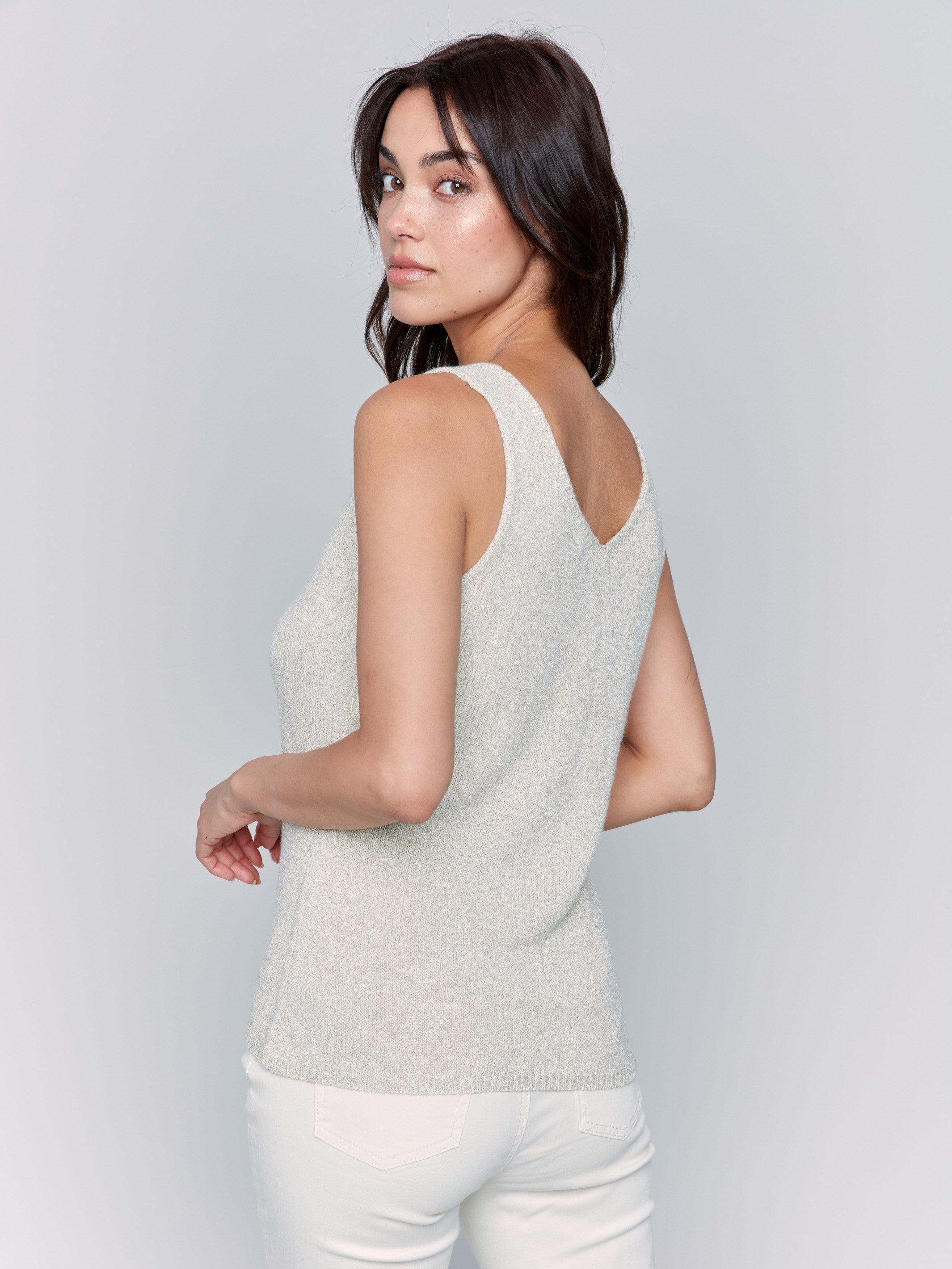 Shimmering gold camisole with elegant sleeveless style by Charlie B.