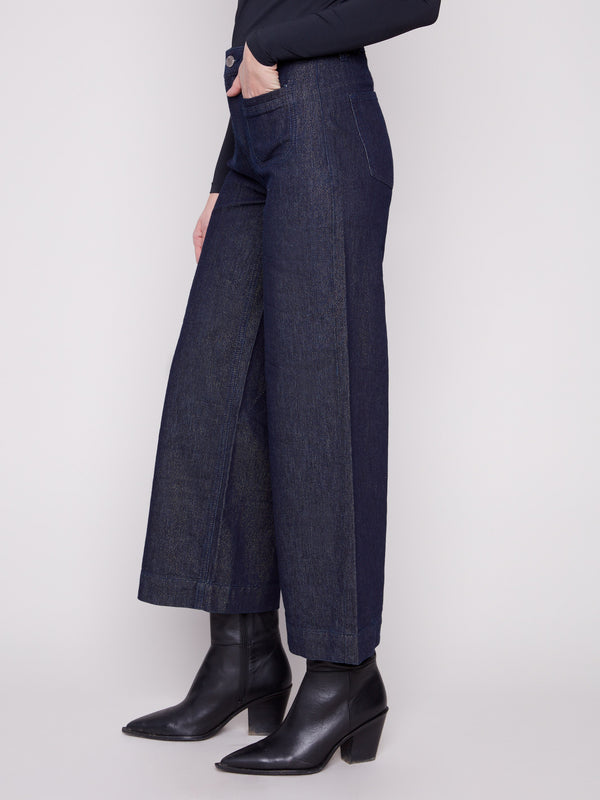 These stretch denim jeans feature a sophisticated metallic sheen, adding elegance to any outfit by Charlie B.