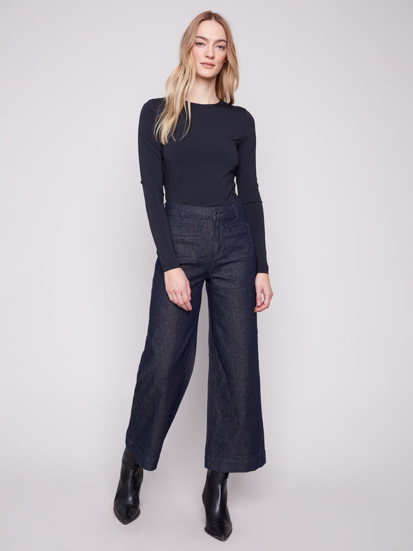 Flare fit jeans in blue black stretch denim, designed for both comfort and modern style by Charlie B.