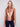 Copper metallic vest featuring two side pockets for added convenience by Charlie B.