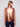 Chic metallic copper vest showcasing a sleek high collar design by Charlie B.