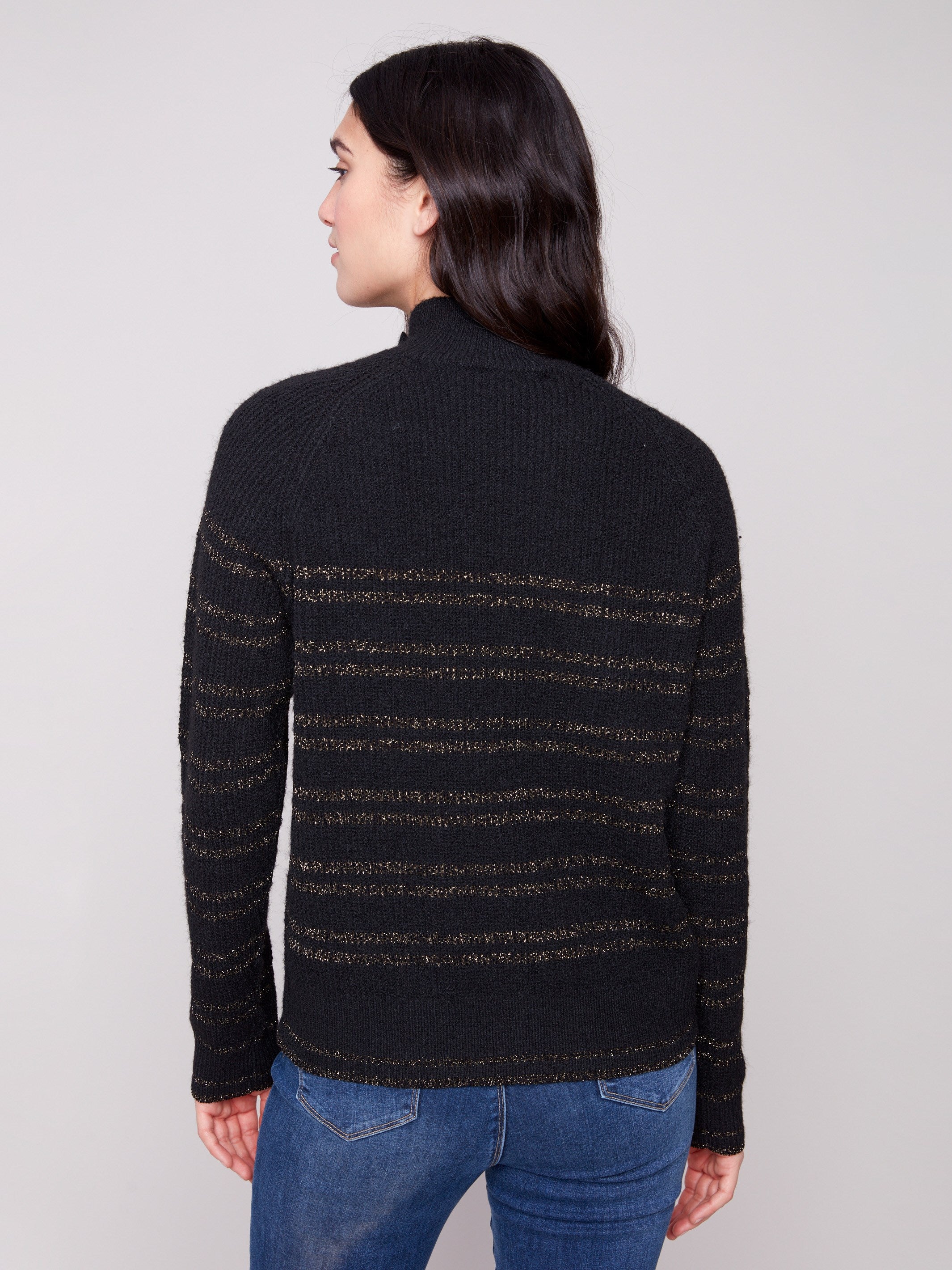 Chic black sweater adorned with shimmering gold metallic stripes, complete with raglan sleeves for added style by Charlie B.
