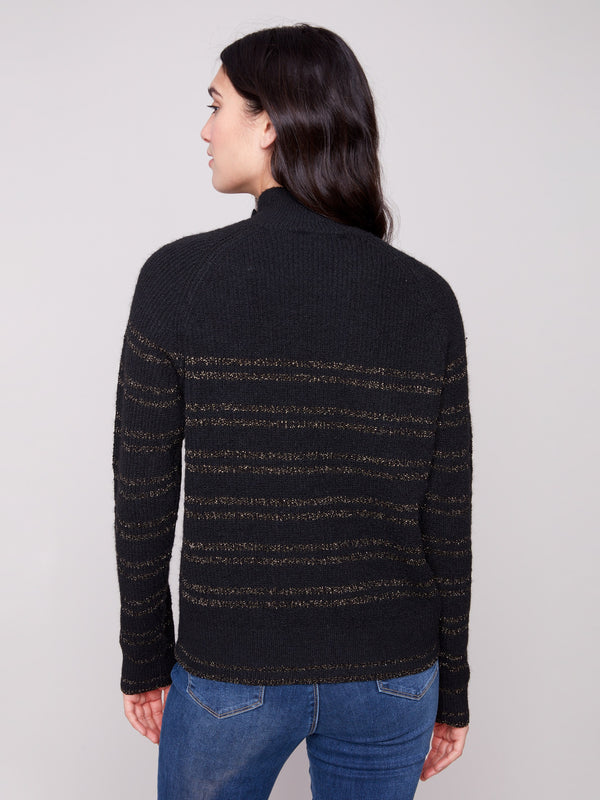 Chic black sweater adorned with shimmering gold metallic stripes, complete with raglan sleeves for added style by Charlie B.