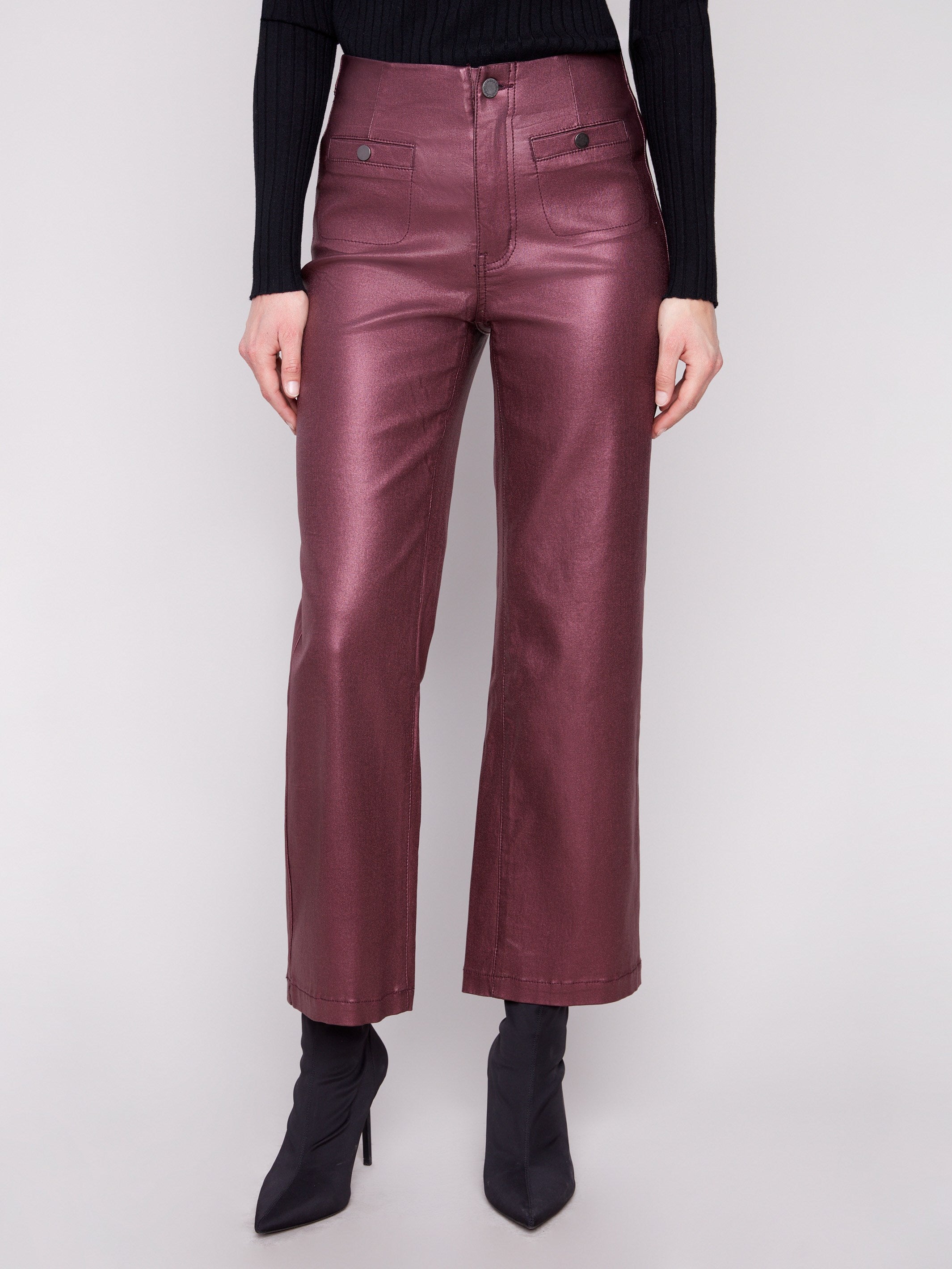 These chic cabernet pants have a convenient zipper closure and welt front pockets for added functionality by Charlie B.