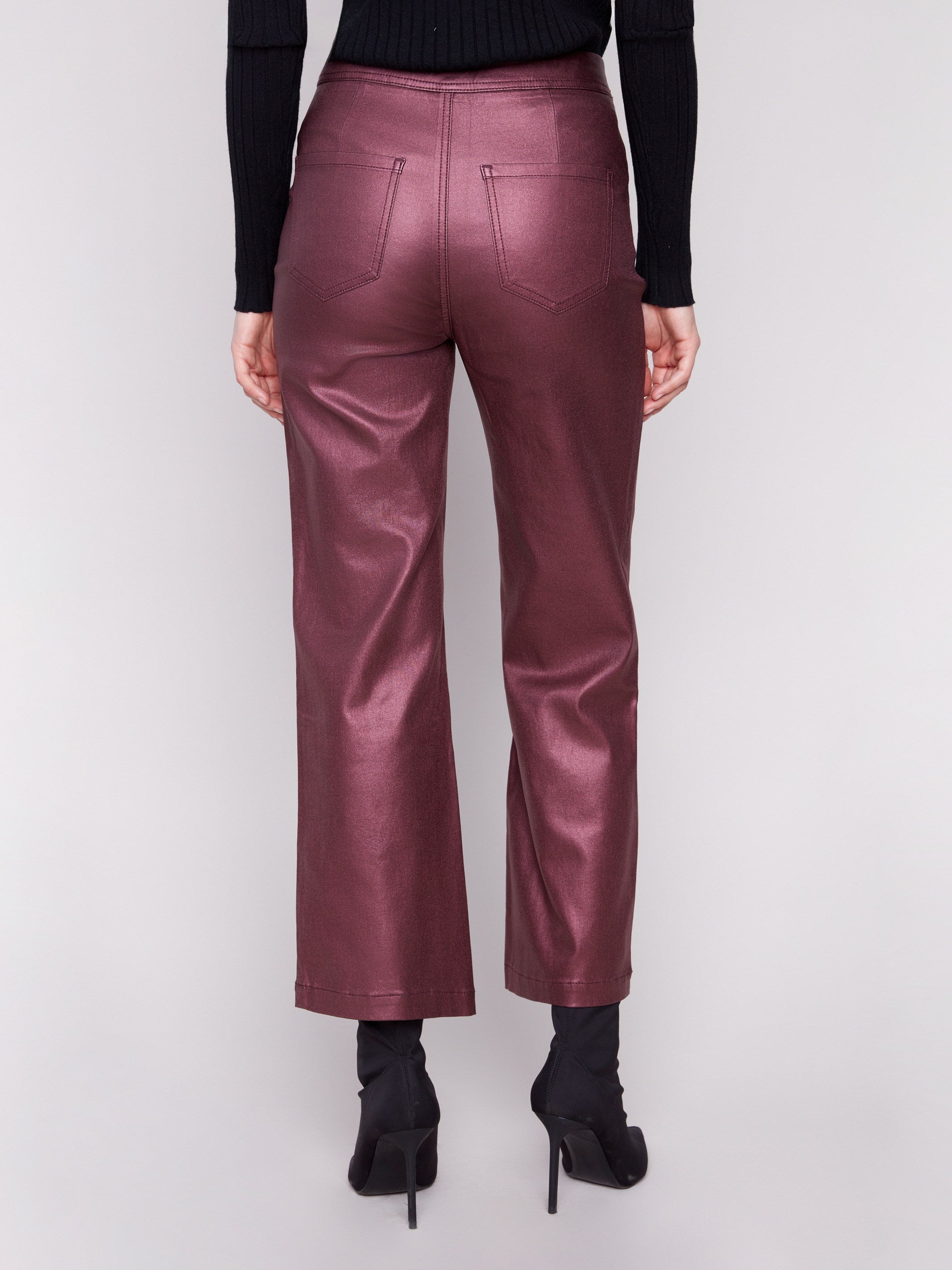 The cropped length of these cabernet flared pants adds an edgy touch to any outfit by Charlie B.